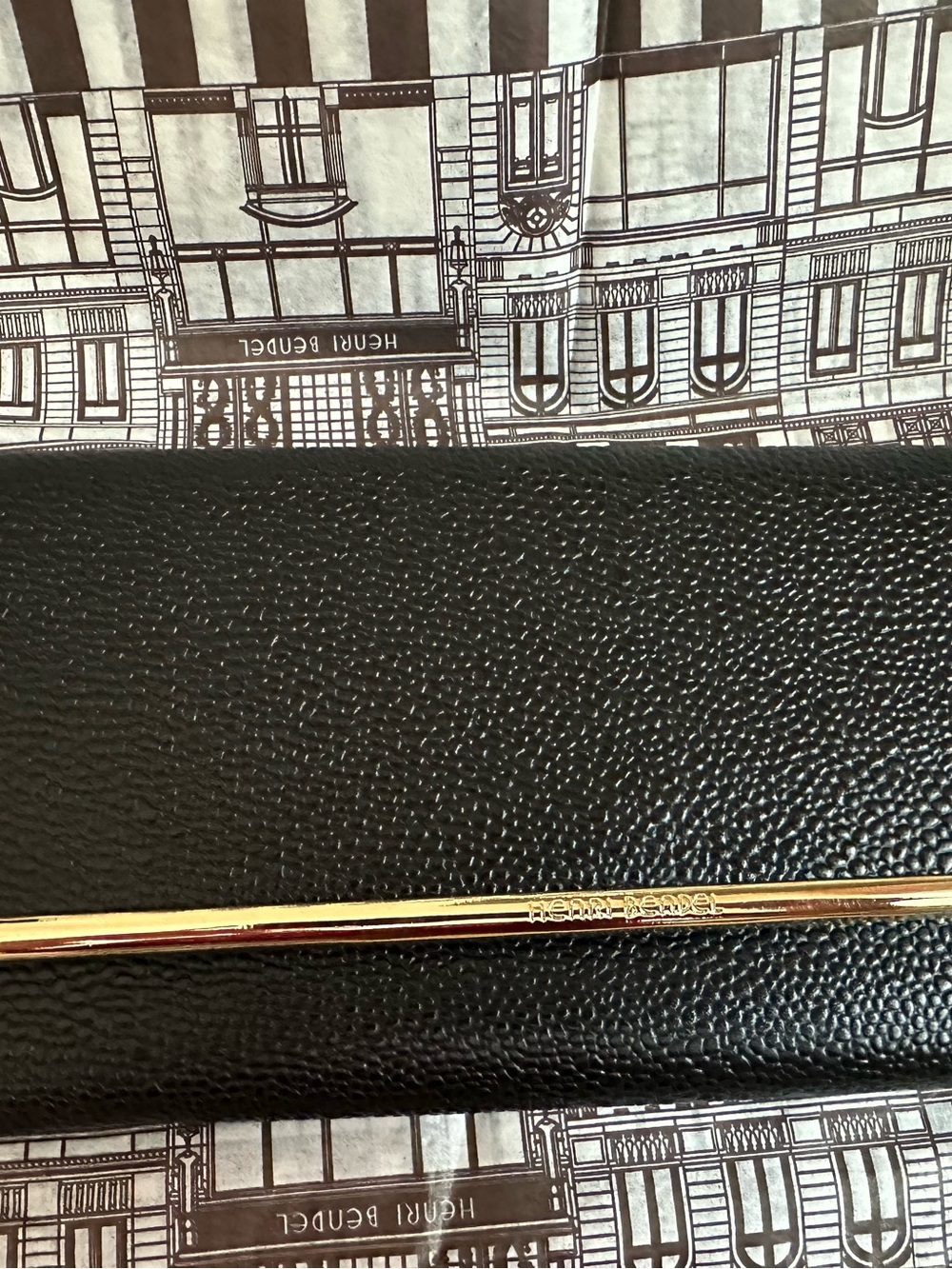 henri bendel black pebbled leather wallet with gold trim